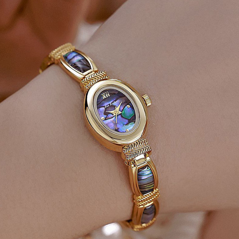 البيضاوي الهاتفي النساء ساعات  - مراجعة Luxury Watch Female وسعره