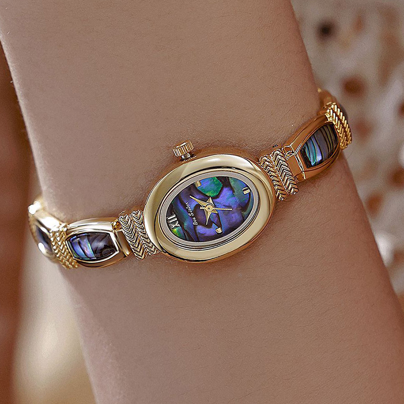 البيضاوي الهاتفي النساء ساعات  - مراجعة Luxury Watch Female وسعره