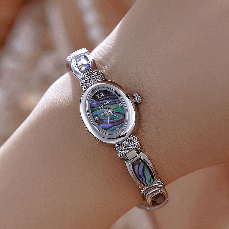 البيضاوي الهاتفي النساء ساعات  - مراجعة Luxury Watch Female وسعره